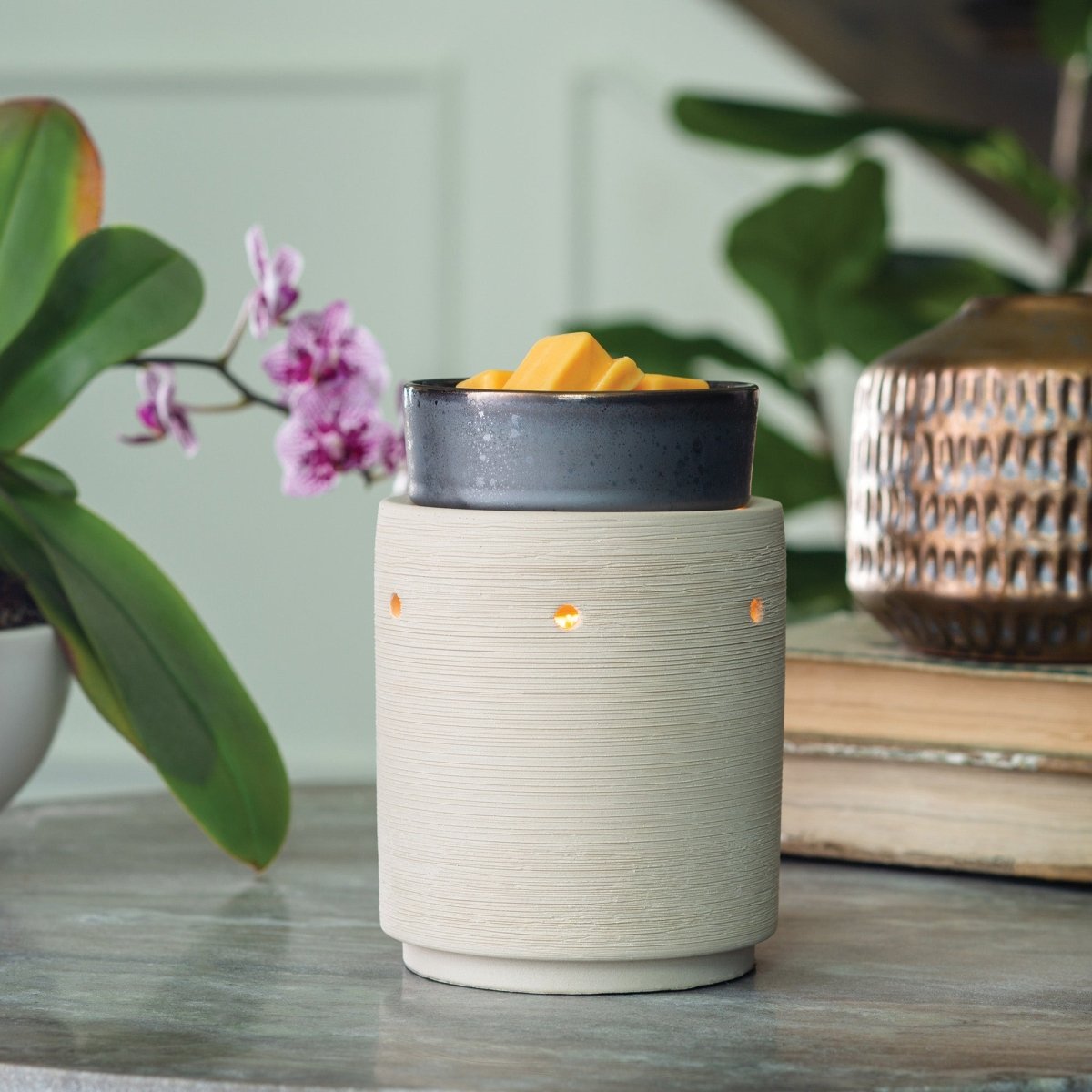 Iron and Clay Illumination Fragrance Wax Melt Warmer on a table