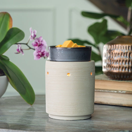Iron and Clay Illumination Fragrance Wax Melt Warmer on a table