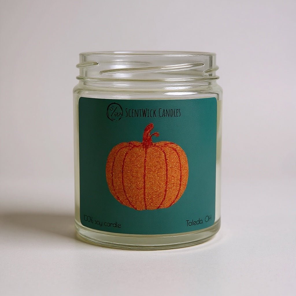 ScentWick Candles Taylor Swift inspired jar with pumpkin design on a teal label against a light gray background