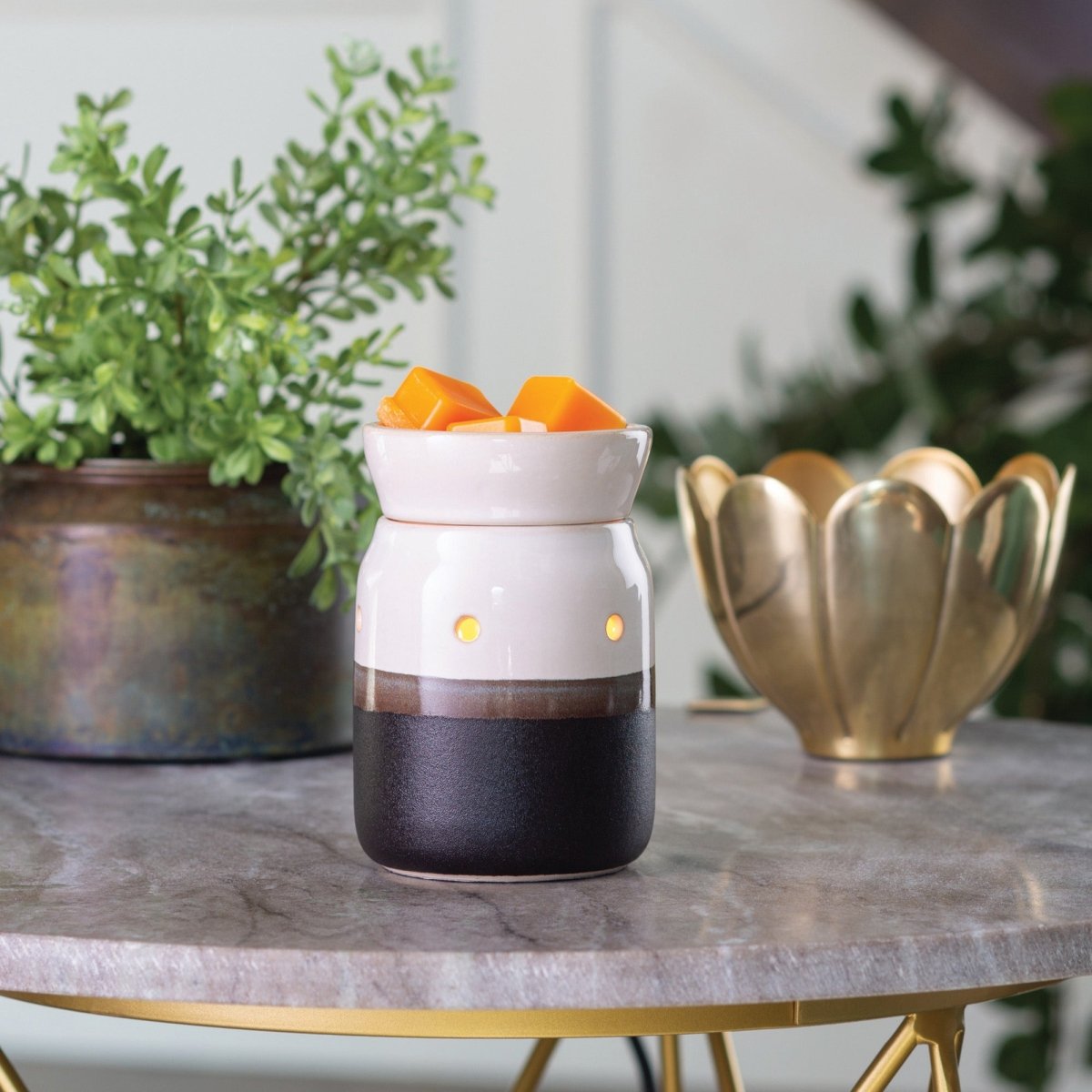 Ivory & Iron Midsize Illumination Fragrance Wax Melt Warmer on a side table