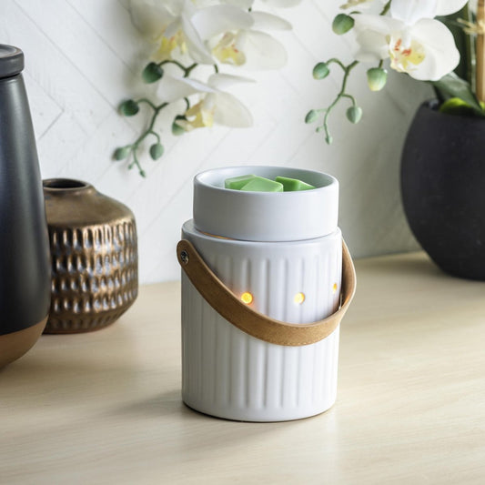 Leather Handle Illumination Fragrance Wax Melt Warmer on a side table