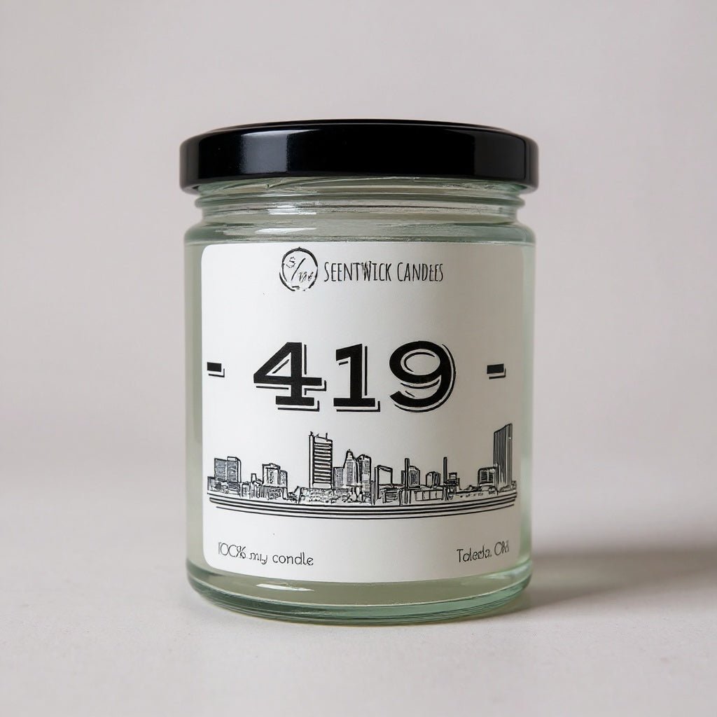 ScentWick Candle jar labeled '419' with a Toledo cityscape design on a light gray background